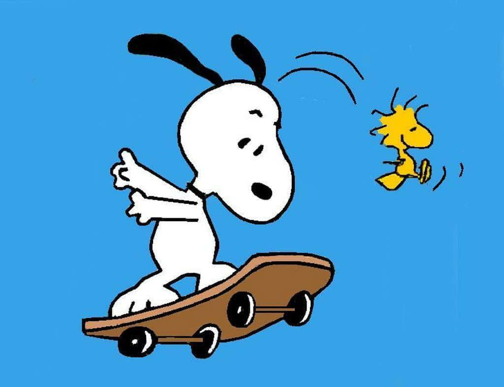 Snoopy skateboarding with Woodstock